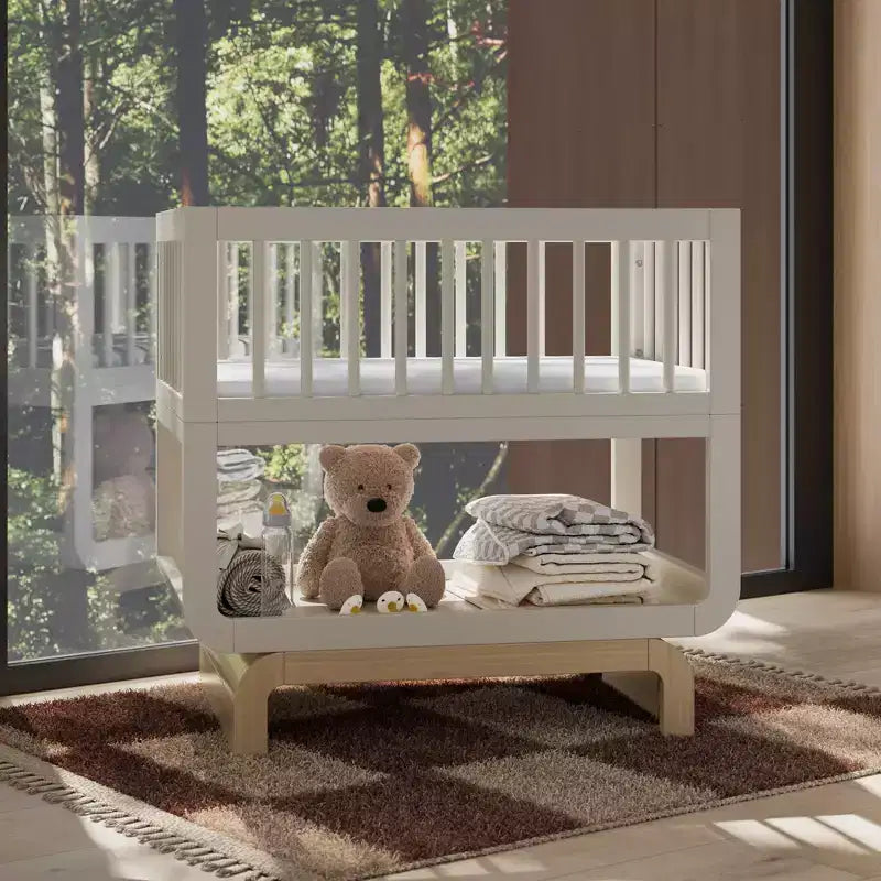 Berceau et coffre à jouets convertibles