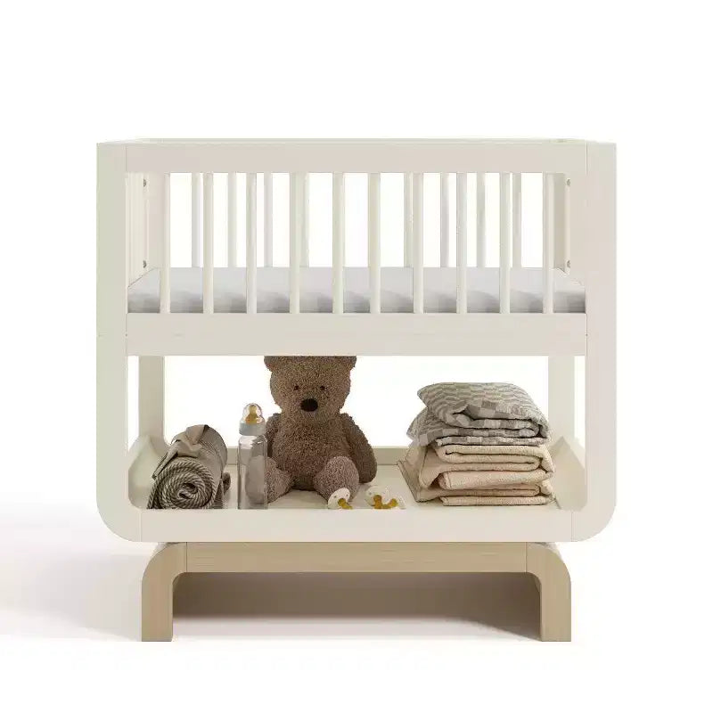 Berceau et coffre à jouets convertibles