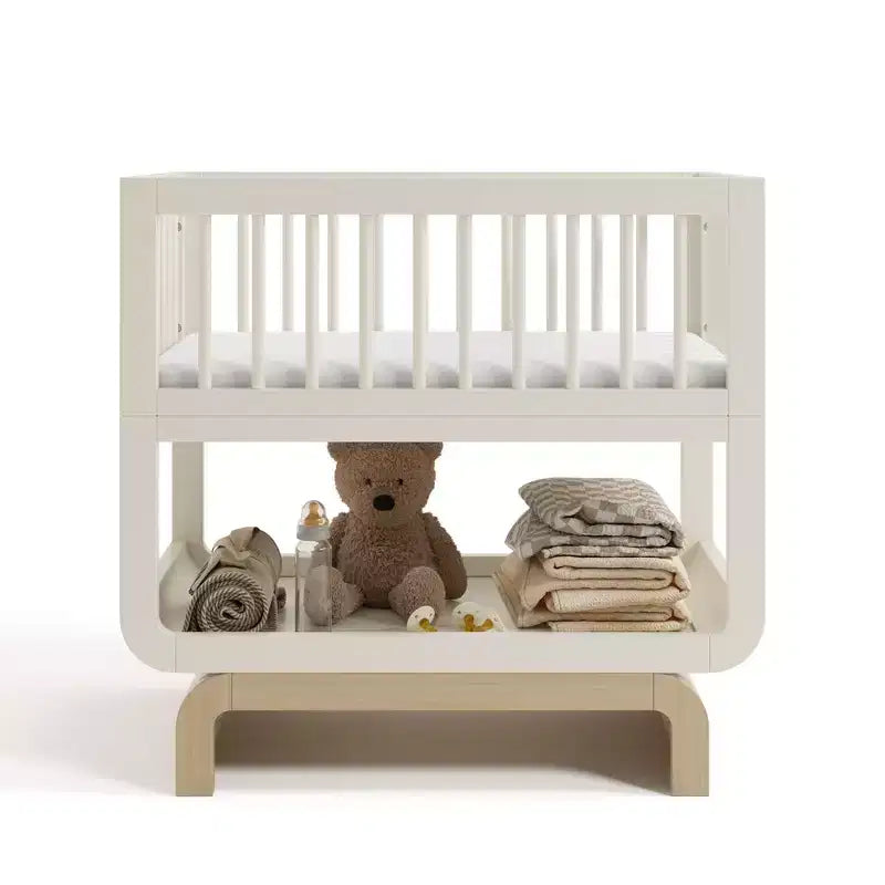 Berceau et coffre à jouets convertibles