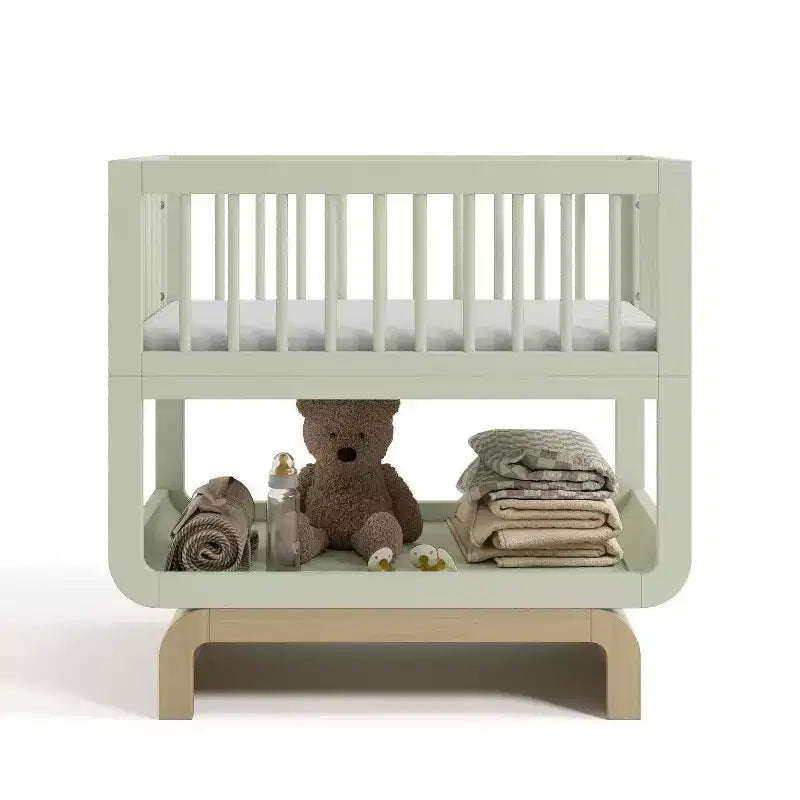 Berceau et coffre à jouets convertibles