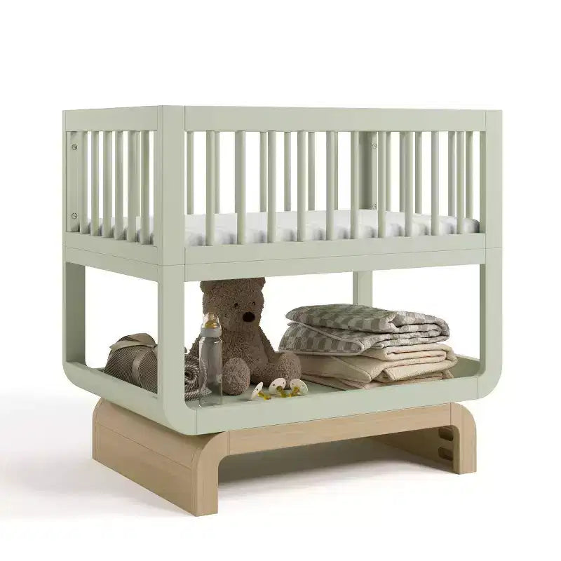 Berceau et coffre à jouets convertibles