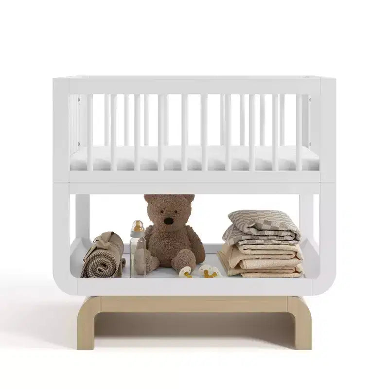 Berceau et coffre à jouets convertibles