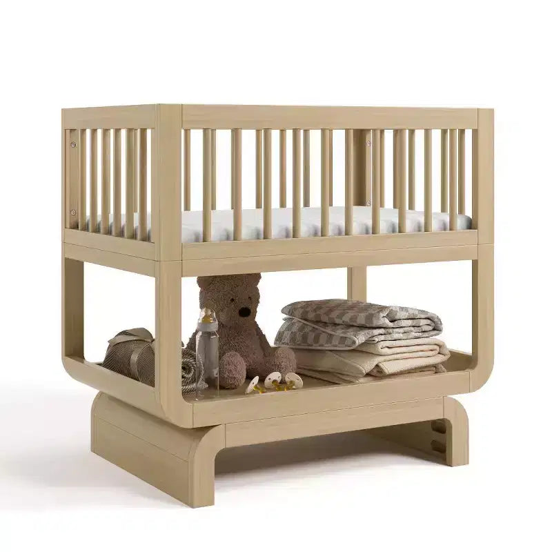 Berceau et coffre à jouets convertibles